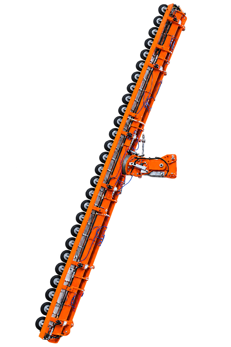 Orange curved-glass lifter beam hanging at an angle, with a row of round black suction pads along one edge and a swivel yoke at the centre.